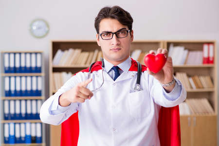 Superhero doctor working in the lab hospitalの写真素材