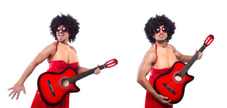 Man in woman clothing with guitarの写真素材
