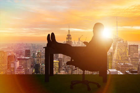 Businessman relaxing in the officeの写真素材