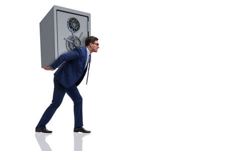 BUsinessman stealing metal safe from bankの写真素材