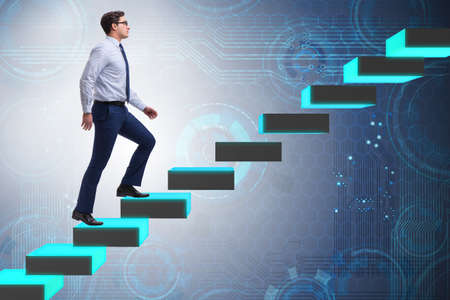 Young businessman climbing career ladder