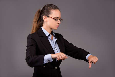 Young woman businesswoman pressing virtual buttonsの写真素材