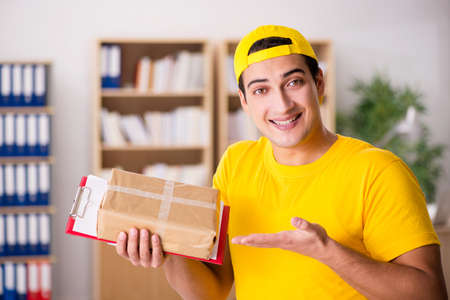Delivery man delivering parcel box
