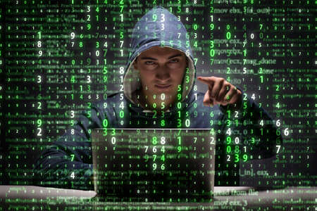 Young hacker in data security concept