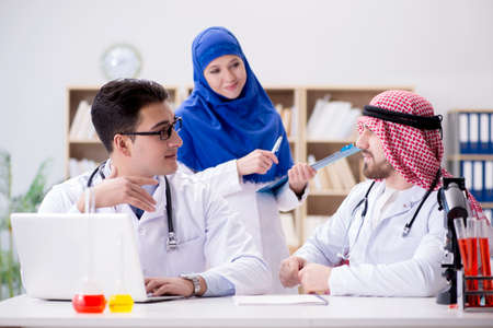 Diversity concept with doctors in hospitalの写真素材