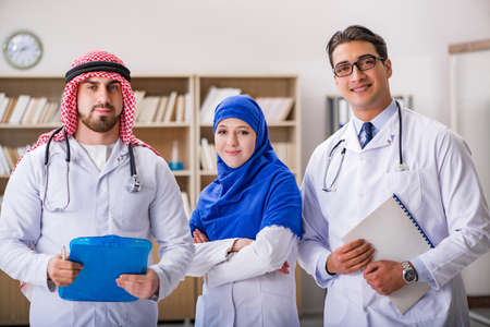 Diversity concept with doctors in hospitalの写真素材