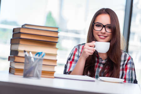 Young woman student preparing for college examsの写真素材