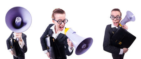 Young businessman with loudspeaker on whiteの写真素材