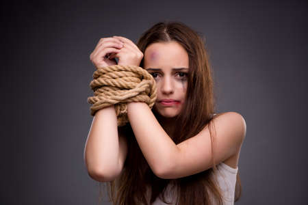 Woman in violence and discrimination conceptの写真素材