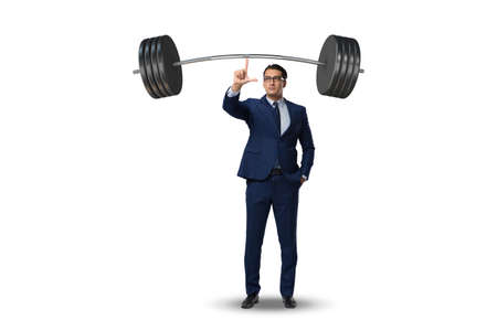 Businessman with barbell in heavy lifting conceptの写真素材