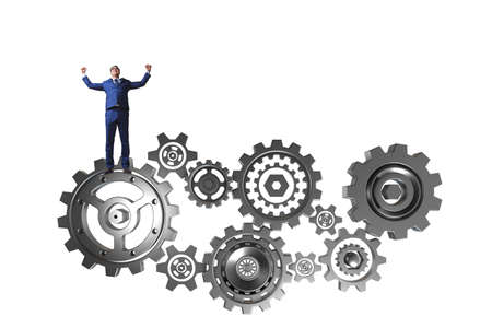 Businessnman in teamwork concept with cogwheelsの写真素材