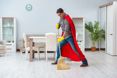 Super hero cleaner working at homeの写真素材