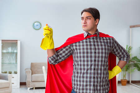 Super hero cleaner working at homeの写真素材