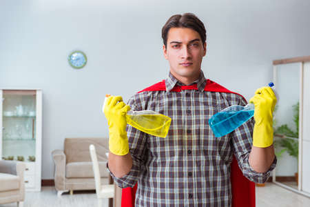 Super hero cleaner working at homeの写真素材