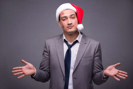 Man wearing santa in funny festive conceptの写真素材