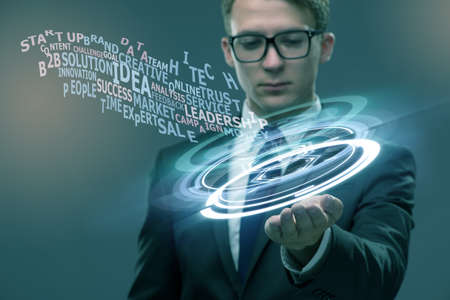 Young businessman in bright idea conceptの写真素材