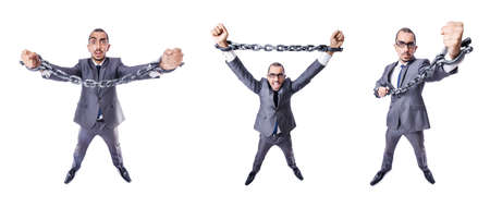 Businessman with handcuffs on whiteの写真素材