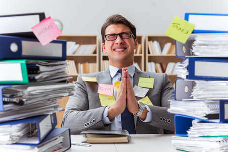 Businessman struggling with multiple priorities