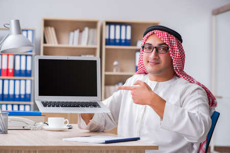 Young arab businessman in business conceptの写真素材