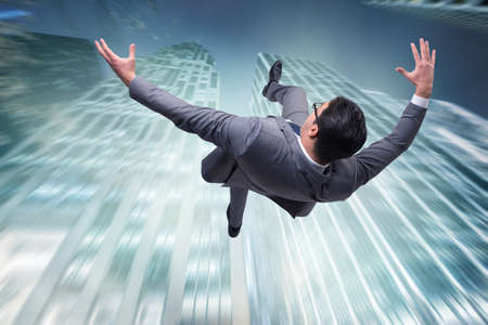 Businessman committing suicide due to crisisの写真素材