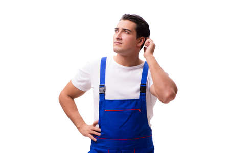 Handsome repairman wearing blue coveralls on whiteの写真素材