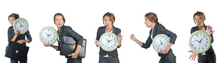 Businesswoman with clock isolated on whiteの写真素材