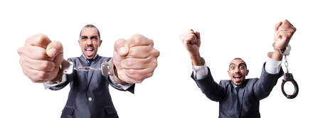 Businessman with chain isolated on the whiteの写真素材