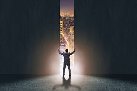 Businessman walking towards his ambitionの写真素材