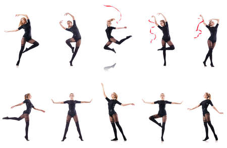 Young woman dancing on white backgroundの写真素材