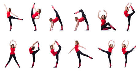 Young gymnast exercising on whiteの写真素材