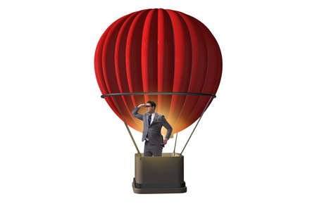 Businessman flying on balloon isolated on whiteの写真素材