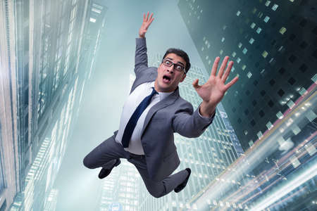 Businessman committing suicide due to crisisの写真素材