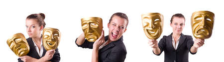 Woman with mask in hypocrisy conceptの写真素材