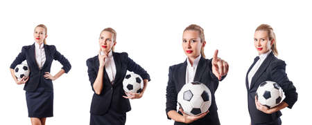 Businesswoman with football on whiteの写真素材