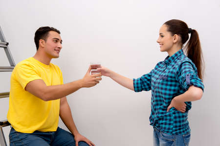 Wife and husband family doing home improvementsの写真素材