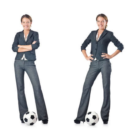 Businesswoman with football on whiteの写真素材