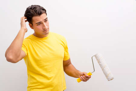 Man painting the wall in DIY conceptの写真素材