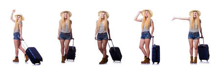Young woman with suitcase on whiteの写真素材