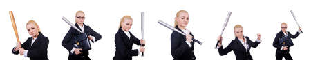 Businesswoman with baseball bat on whiteの写真素材