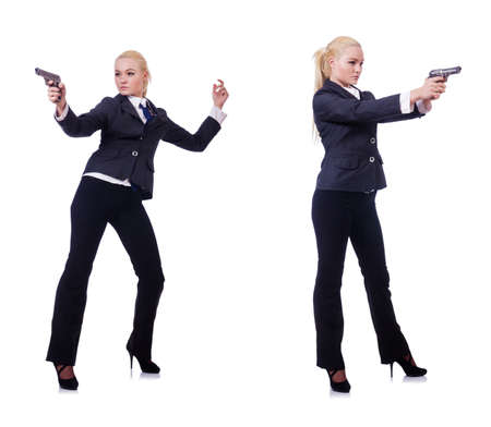 Woman with gun isolated on whiteの写真素材