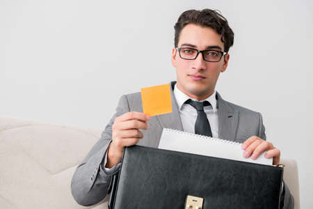 Businessman with briefcase in business concept