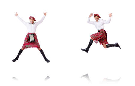 Scottish man dancing on whiteの写真素材
