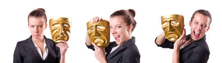 Woman with mask in hypocrisy conceptの写真素材