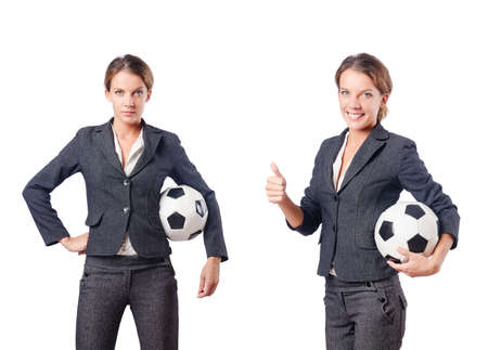 Businesswoman with football on whiteの写真素材