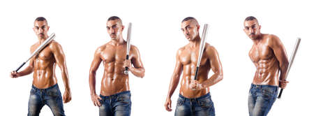 Muscular man with baseball bat on whiteの写真素材