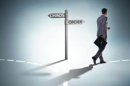 Businessman in difficult choice conceptの写真素材