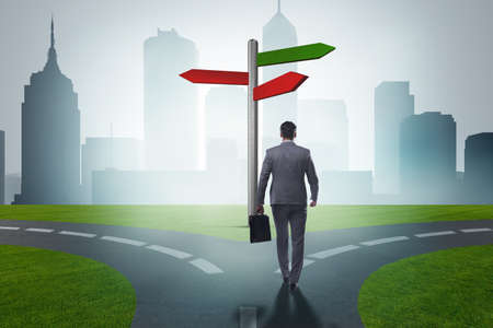 Businessman in difficult choice concept