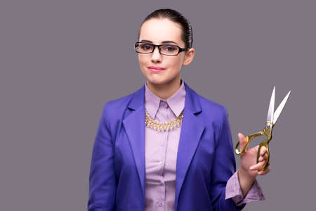 Woman tailor pressing virtual buttonの写真素材