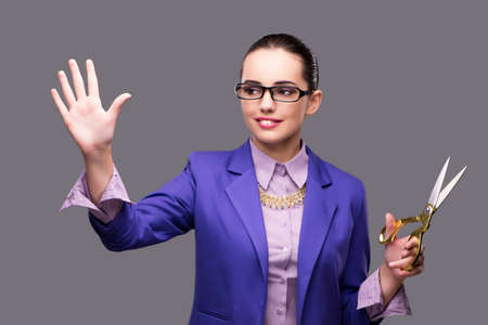 Woman tailor pressing virtual buttonの写真素材