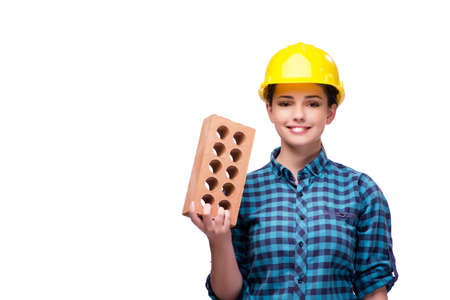 Young woman in industrial concept isolated on whiteの写真素材